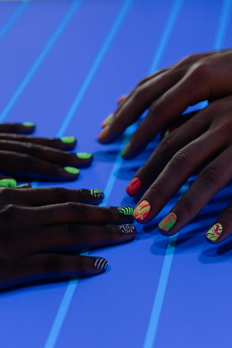 Neon nail art under UV light